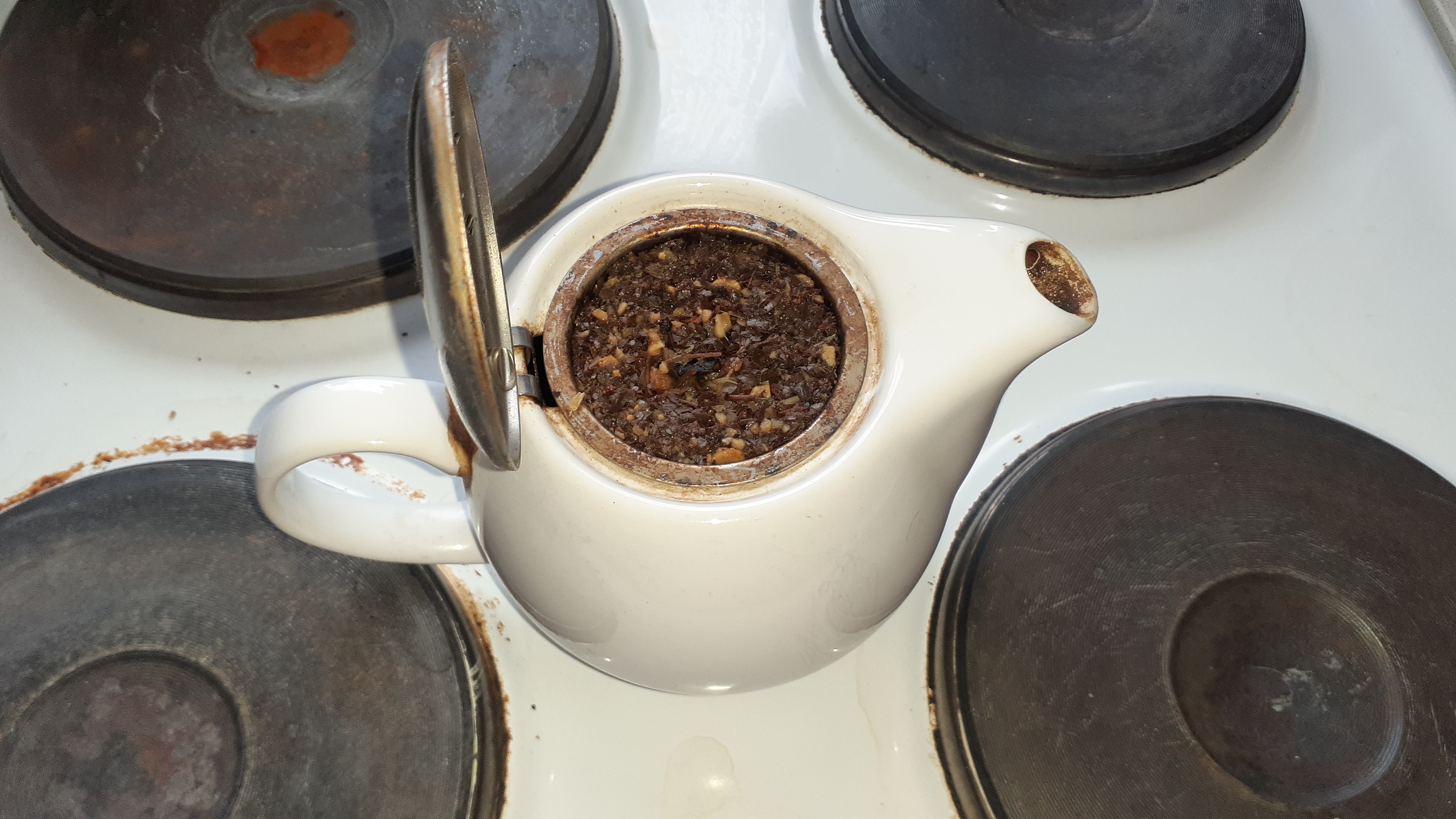 Some chai tea in a white tea pot